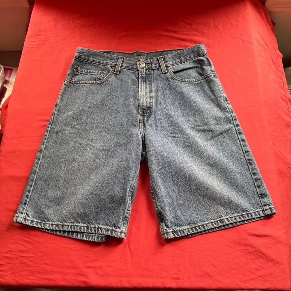 Vintage Levi Strauss & Co. 550 medium blue denim Relaxed Fit Jorts- Size W32